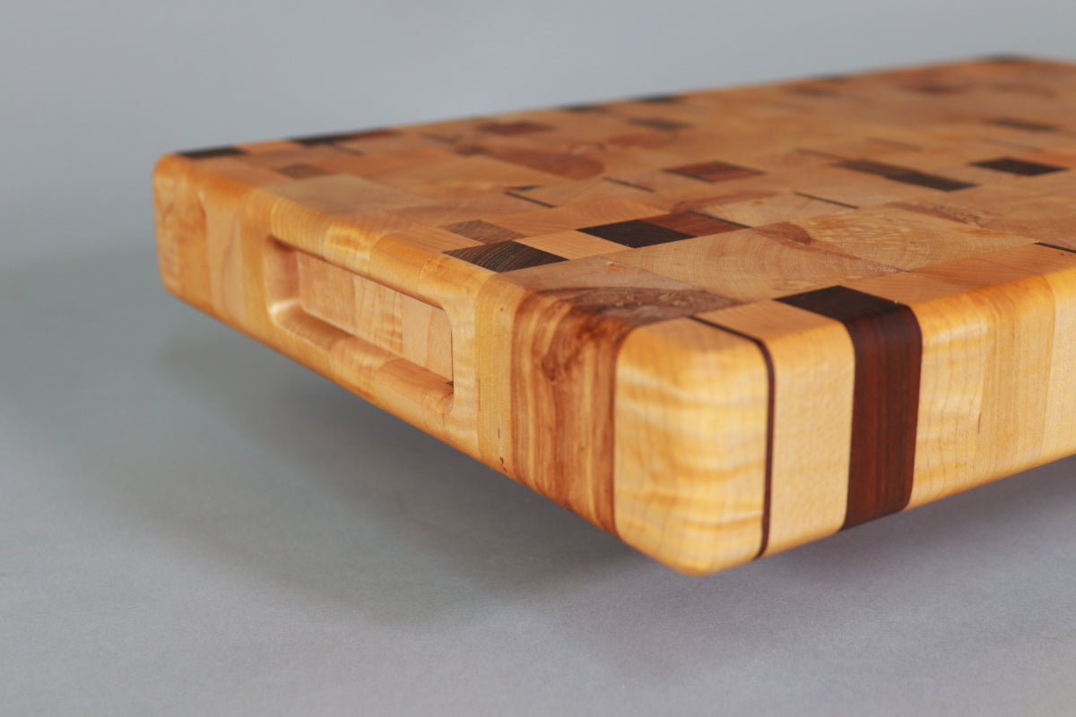 board has recessed handles on each of the two shorter sides