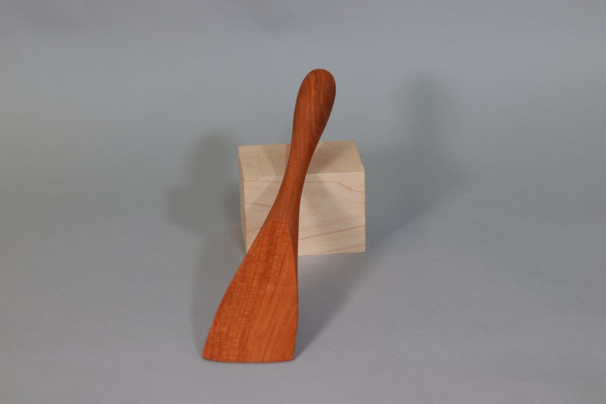 Front view of cherry sauté paddle stirring stick made of salvaged cherry wood.