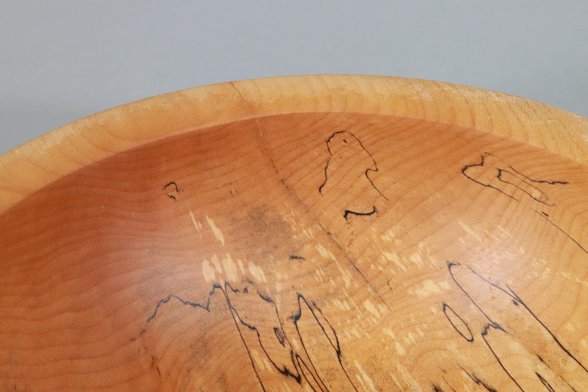 interior view of spalted maple bowl showing repaired crack.